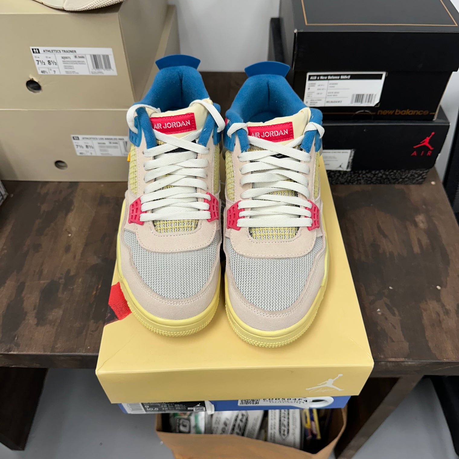 Union Guava Ice Jordan 4 Retro (USED)