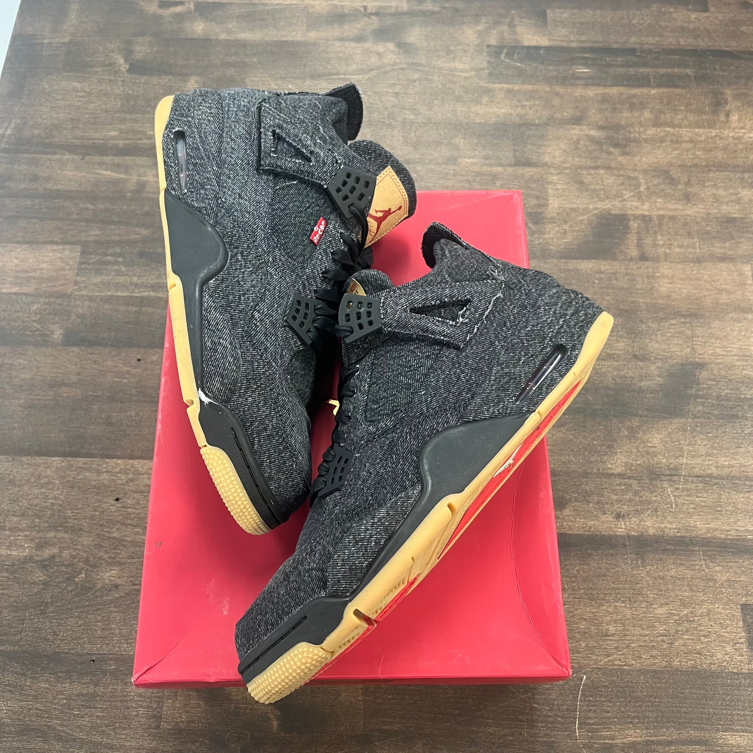 Black Levi Tag Jordan 4 (USED)