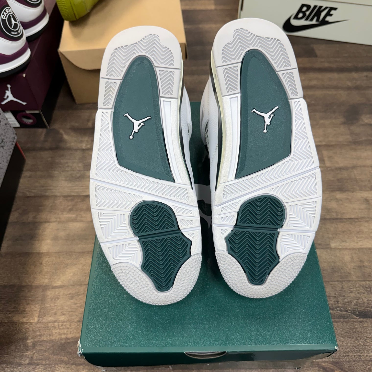 Oxidized Green Jordan 4 Retro (USED)