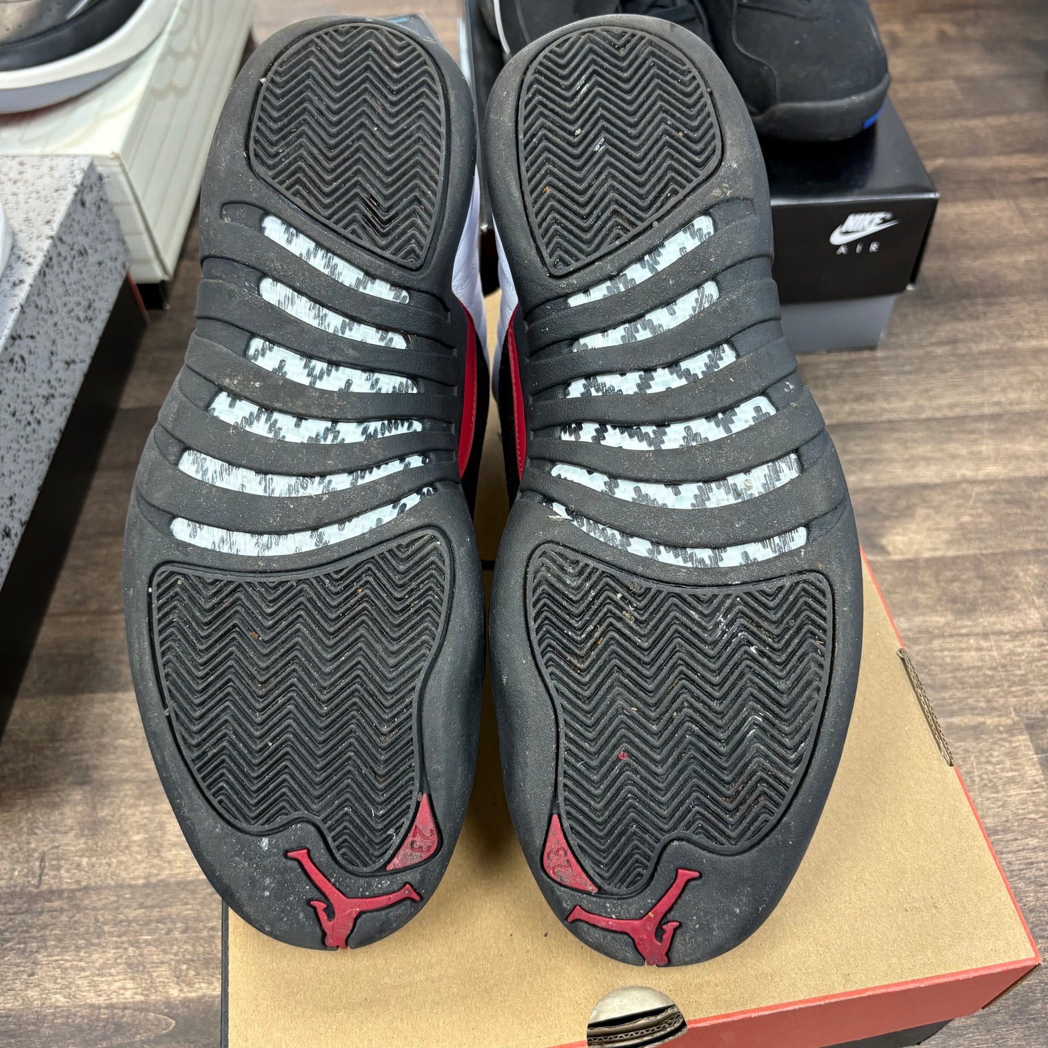 Taxi Flip Jordan 12 Retro (USED)