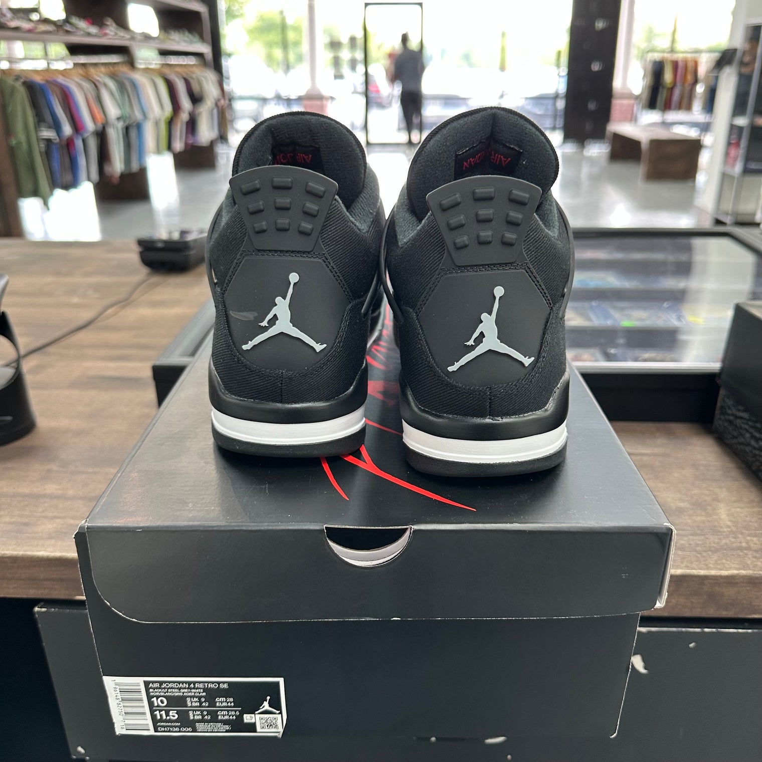 Black Canvas Jordan 4 (Lightly Worn)