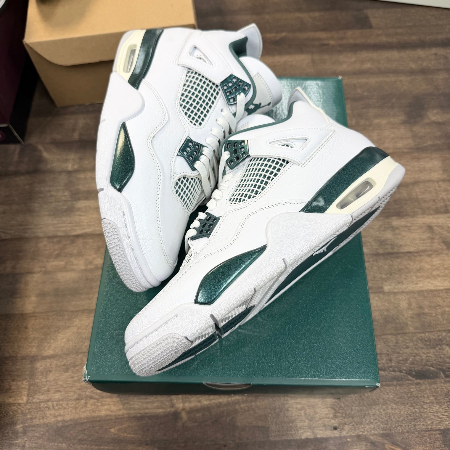 Oxidized Green Jordan 4 Retro (USED)