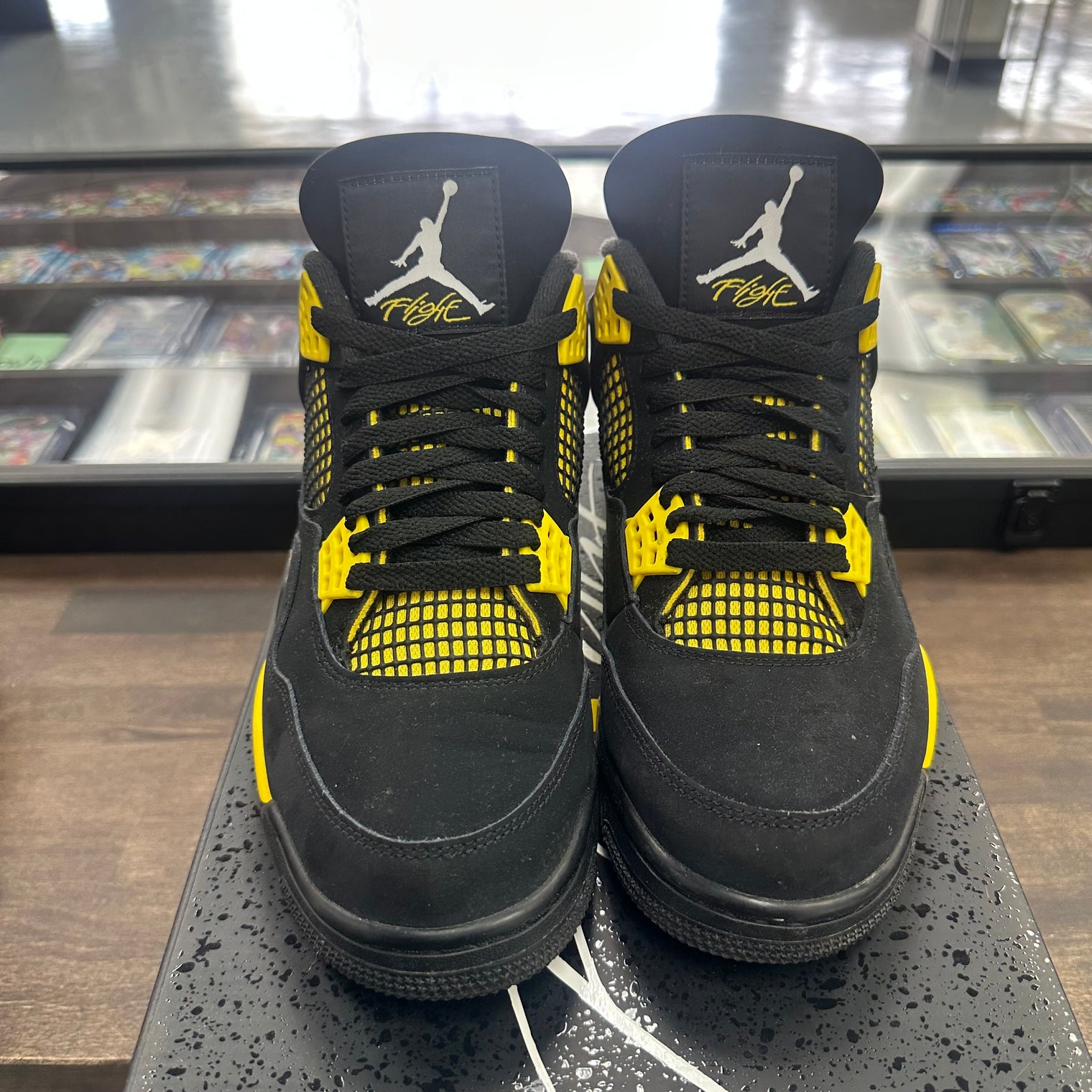 Yellow Thunder Jordan 4 (USED)