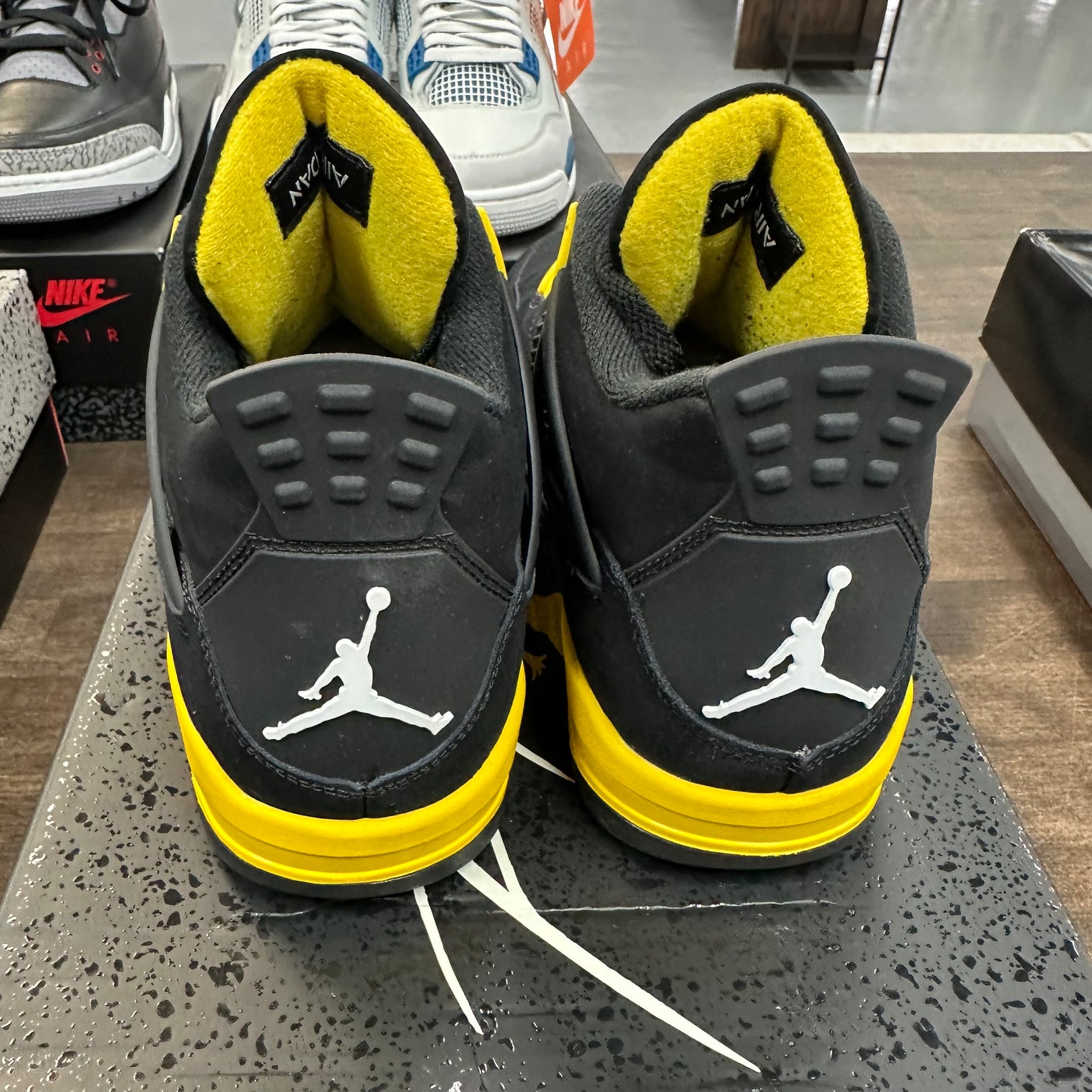 Yellow Thunder Jordan 4 (USED)