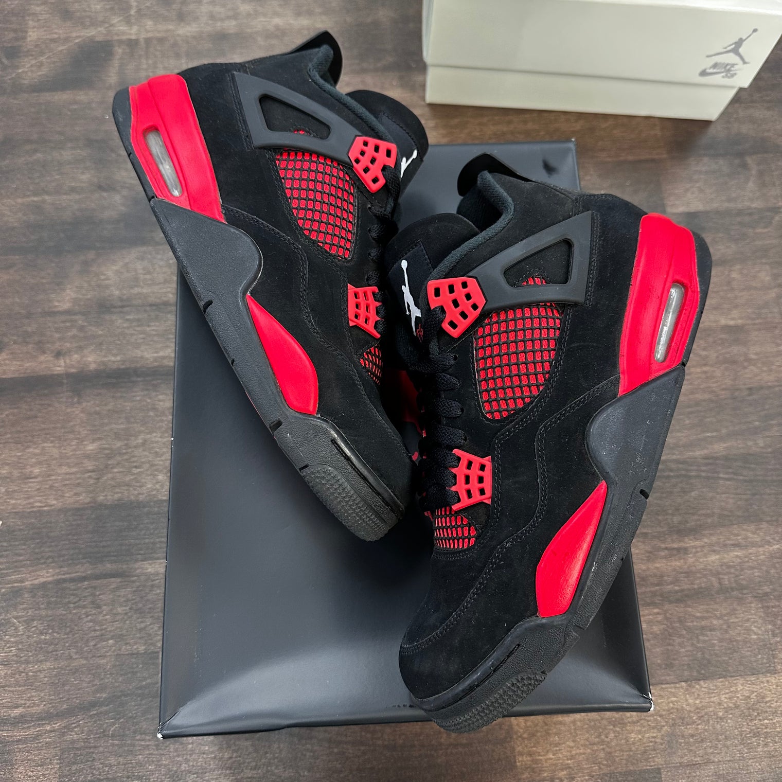 Red Thunder Jordan 4 (USED)