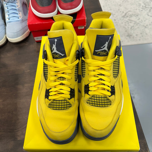 Lightning Jordan 4  (USED)