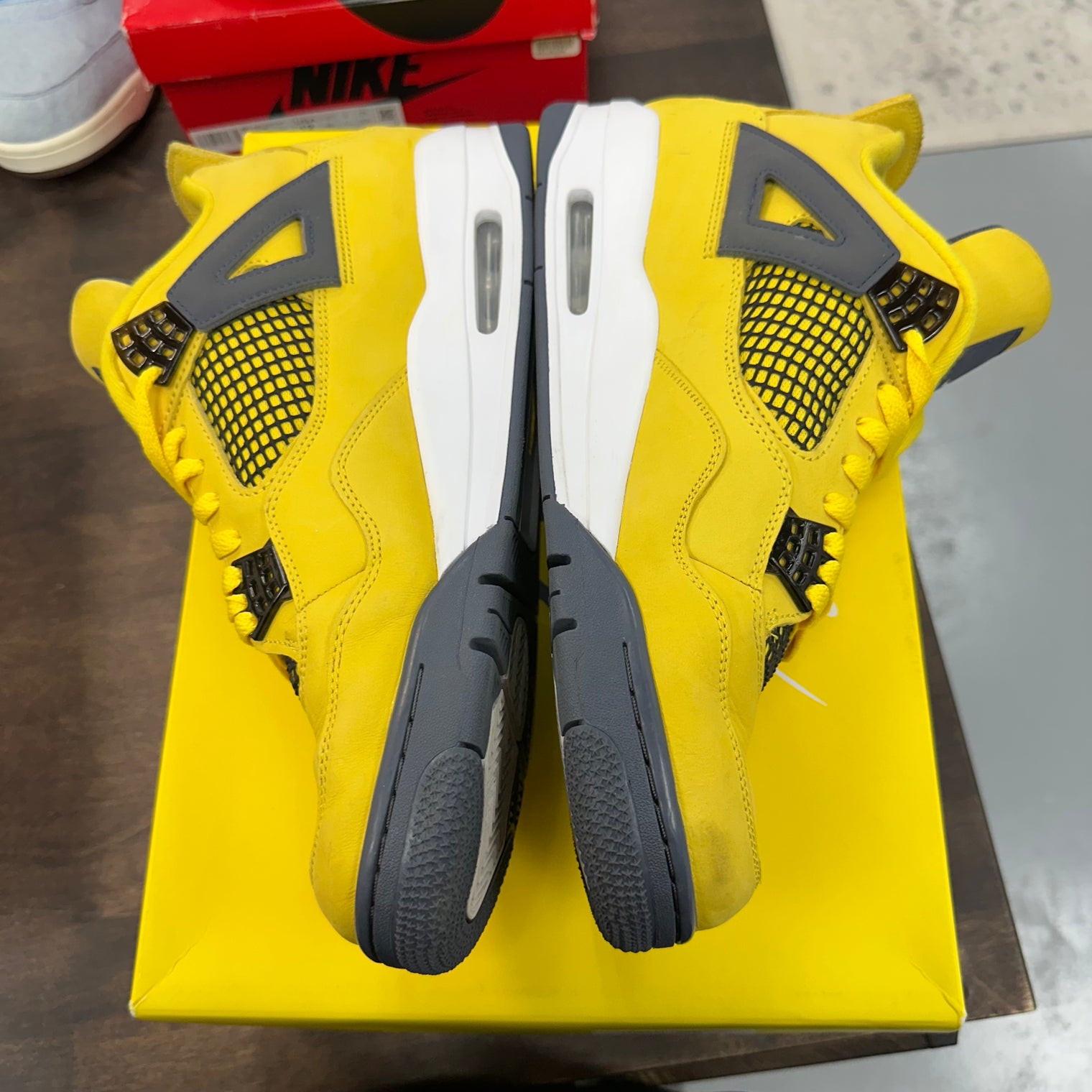 Lightning Jordan 4  (USED)