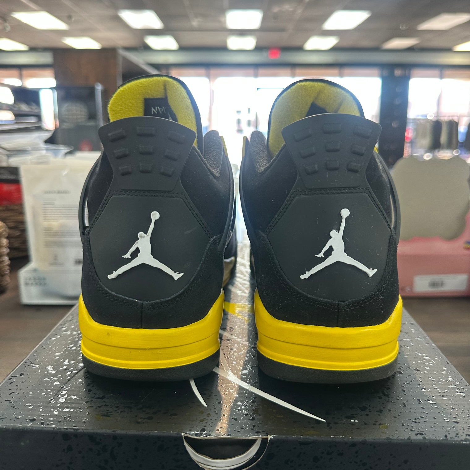 Yellow Thunder Jordan 4 (USED)