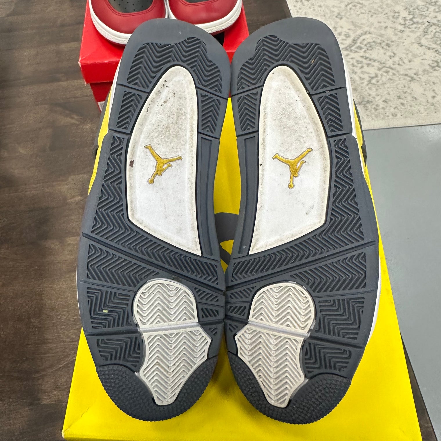 Lightning Jordan 4  (USED)