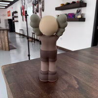 Kaws Holiday UK Vinyl Figure Brown (Displayed)