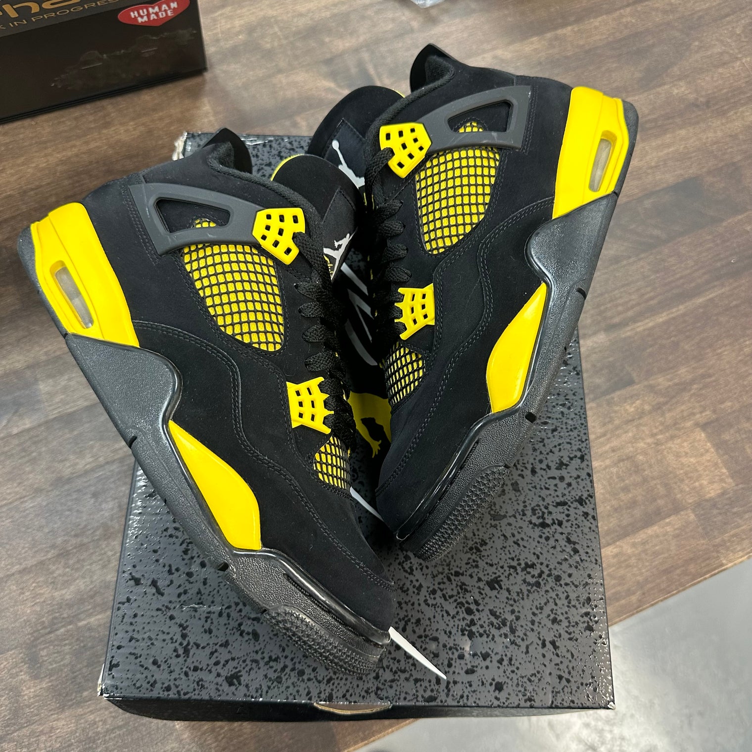 Yellow Thunder Jordan 4 (USED)