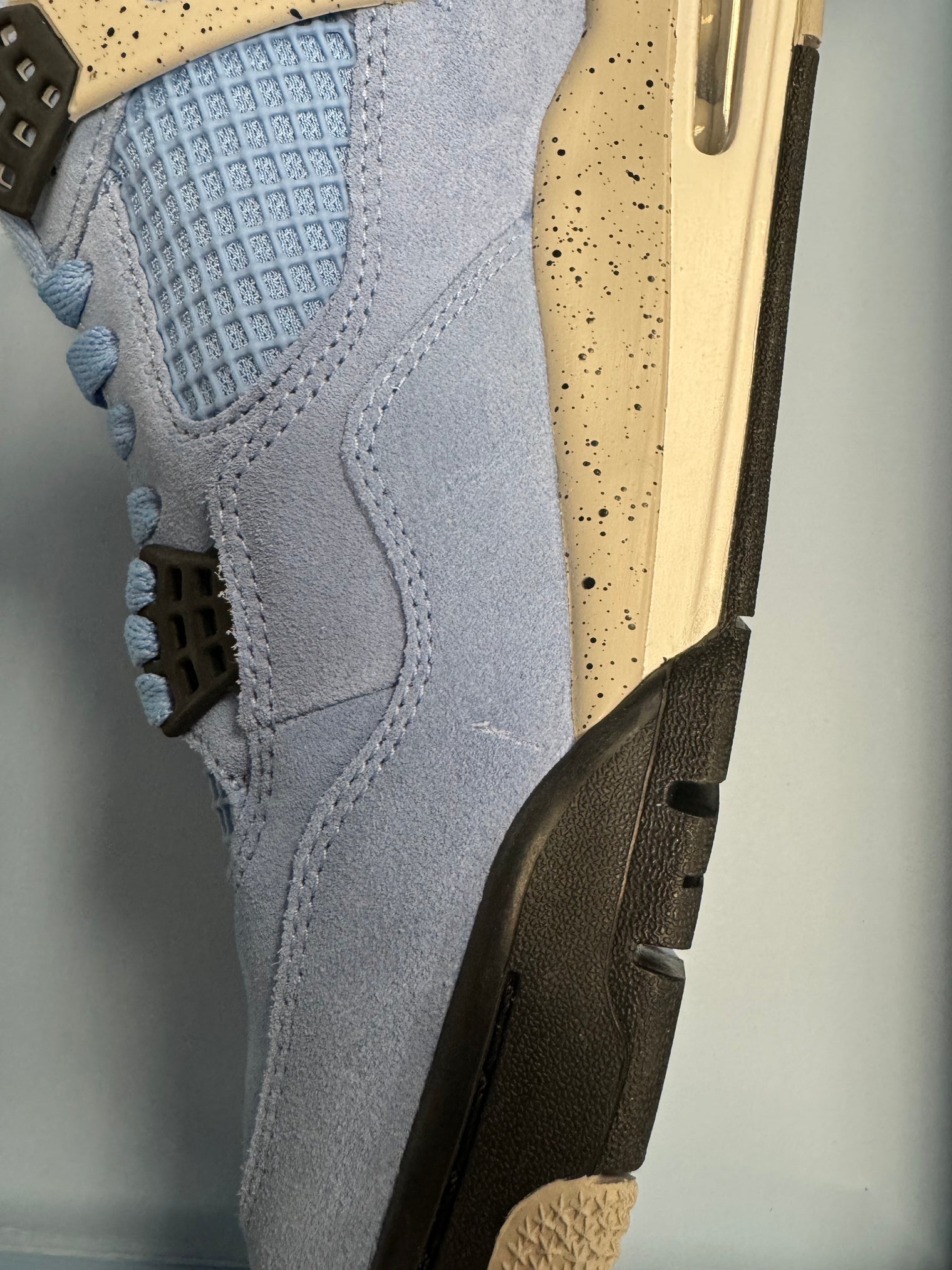 University Blue Jordan 4 Retro (New with Defects)