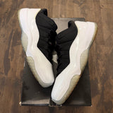 Jordan 11 Retro Low Tuxedo - Image 1