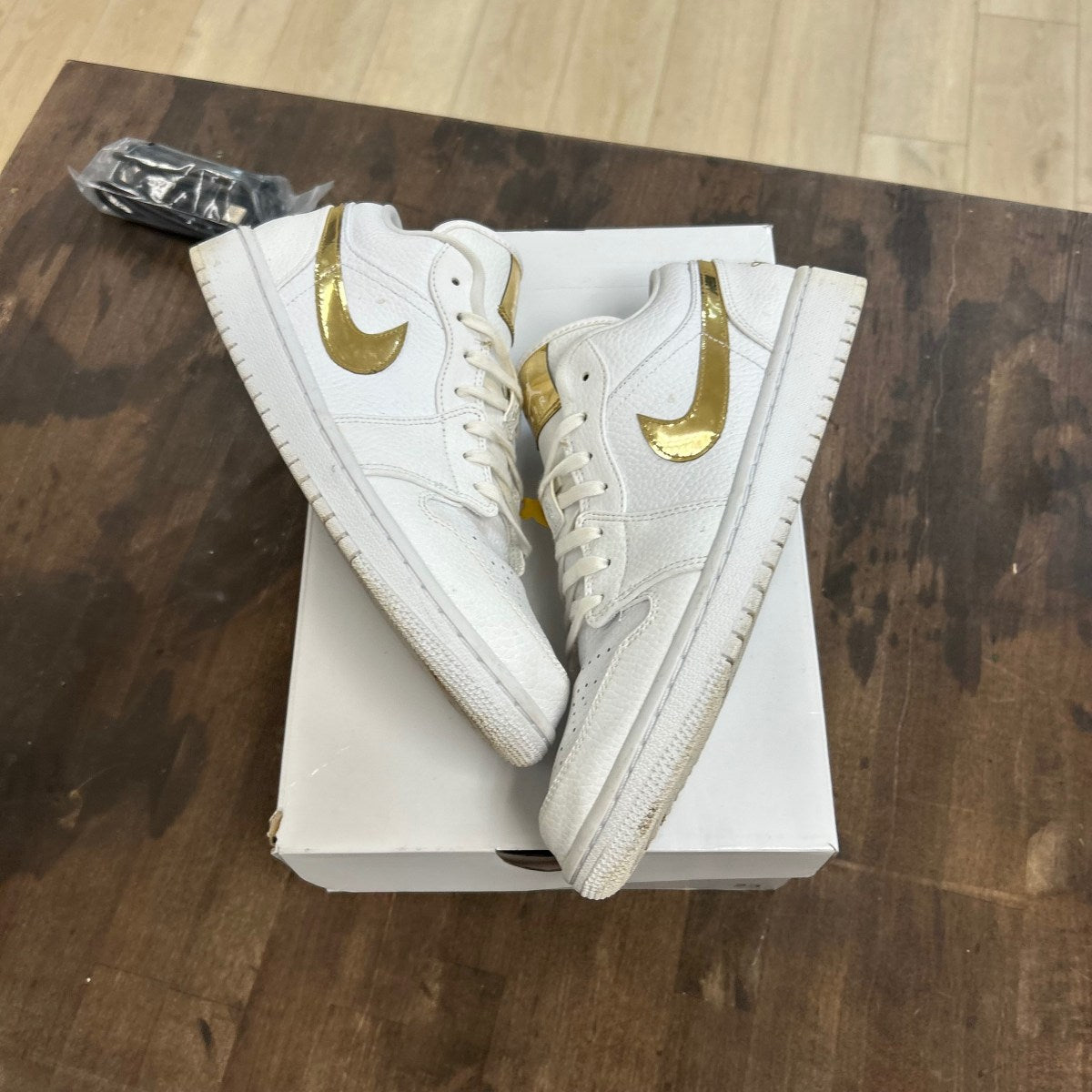 Jordan 1 Low White Metallic Gold (Women's) - Image 1