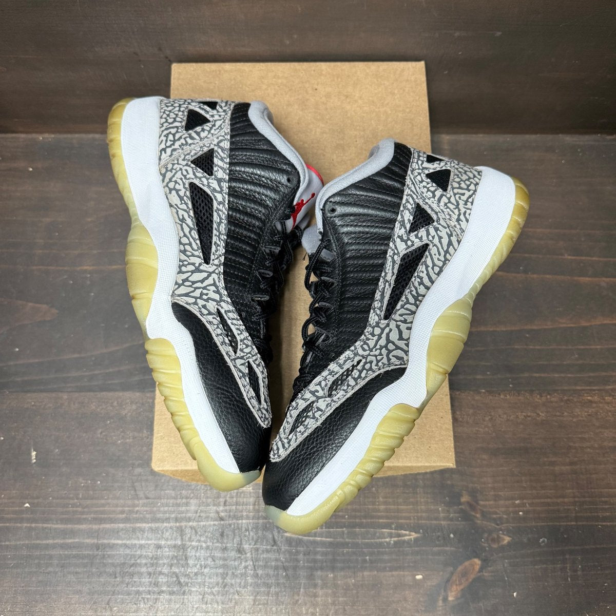 Jordan 11 Retro Low IE Black Cement Size 9.5 (Pre-Owned) - tag