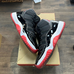 Jordan 11 Retro Playoffs Bred (2019) - Image 1