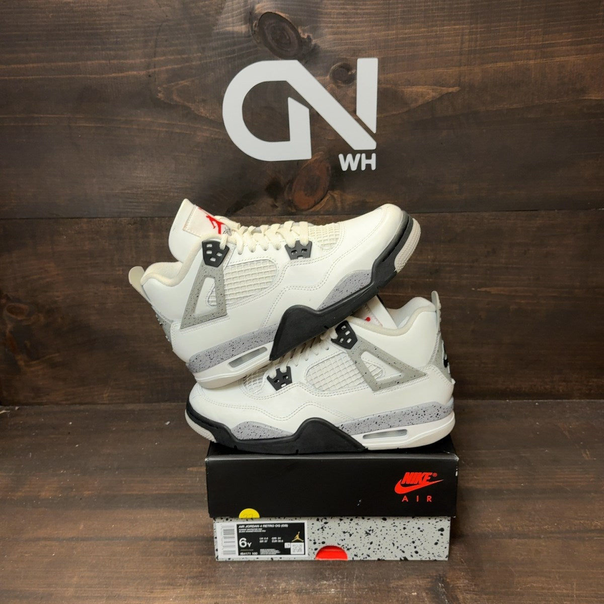 Jordan 4 Retro White Cement (2025) (GS) - Image 1