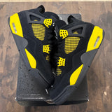 Jordan 4 Retro Thunder (2023) - Image 1