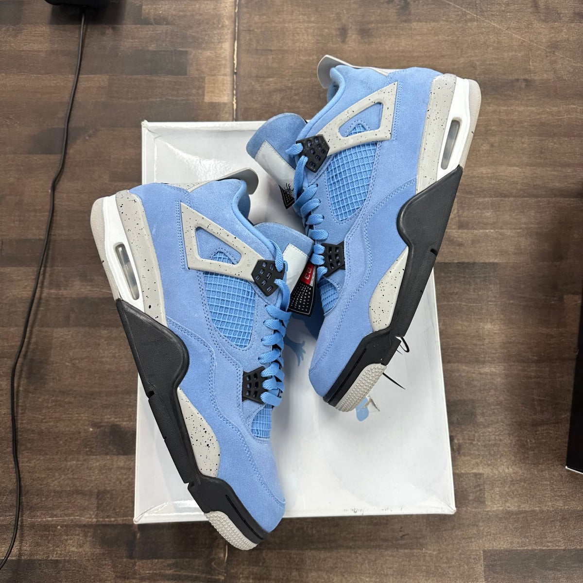 Jordan 4 Retro University Blue - Image 1
