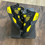 Jordan 4 Retro Thunder (2023) (Grade school) (US 5.5Y) (Lightly Worn) Size 5.5Y (Pre-Owned) - Image 1
