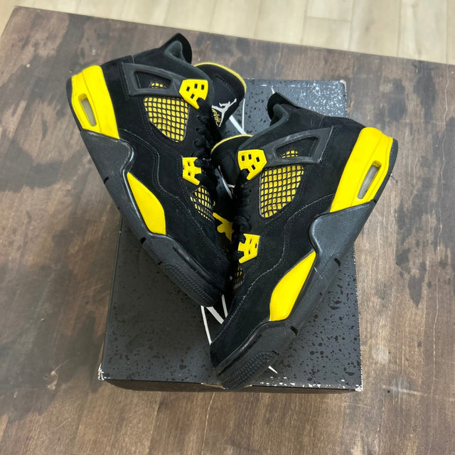Jordan 4 Retro Thunder (2023) (Grade school) (US 5.5Y) (Lightly Worn) Size 5.5Y (Pre-Owned) - Image 1