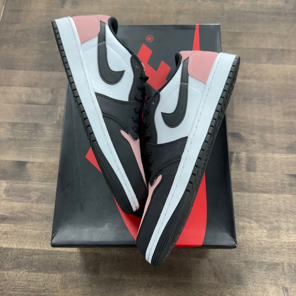 Jordan 1 Low OG Bleached Coral - Image 1