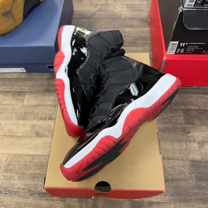Jordan 11 Retro Playoffs Bred (2019) - Image 1