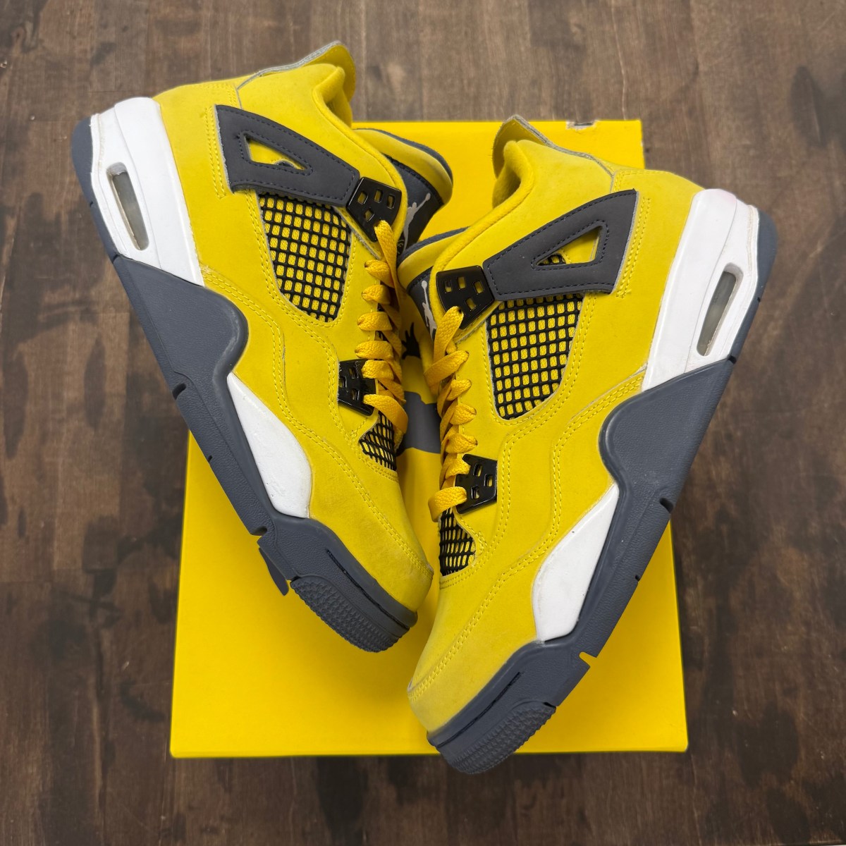 Jordan 4 Retro Lightning (2021) (GS) - Image 1
