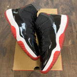 Jordan 11 Retro Playoffs Bred (2019) - Image 1