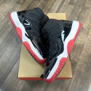 Jordan 11 Retro Playoffs Bred (2019) Size 9.5 (Pre-Owned) - Image 1