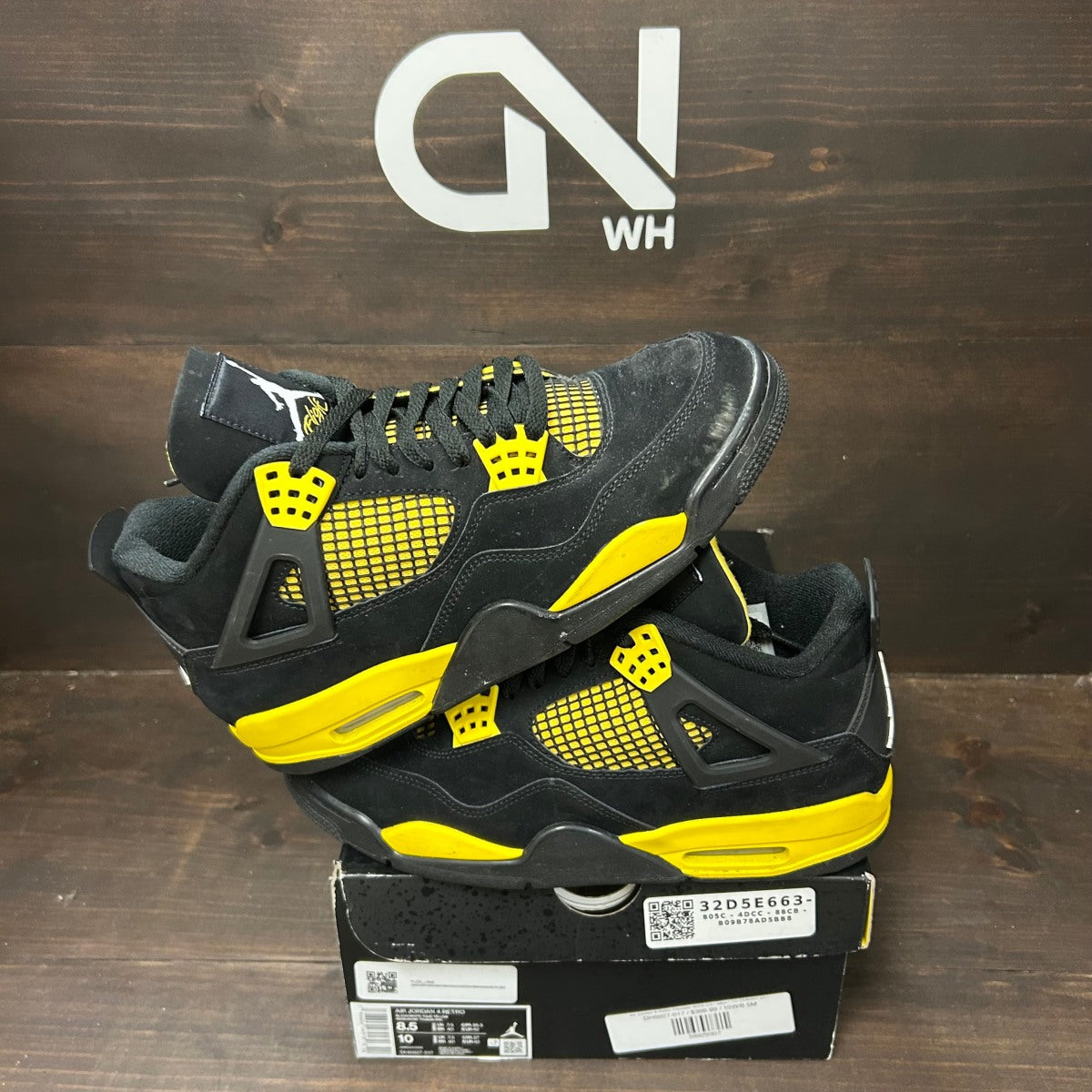 Jordan 4 Retro Thunder (2023) - Image 1