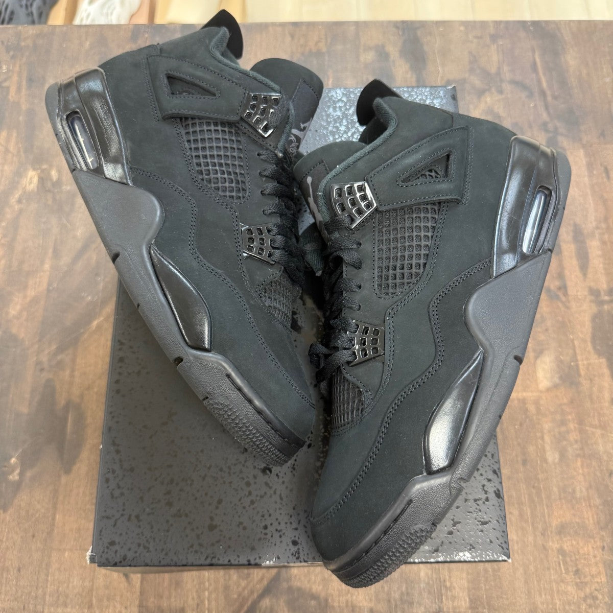 Jordan 4 Retro Black Cat (2025) - Image 1