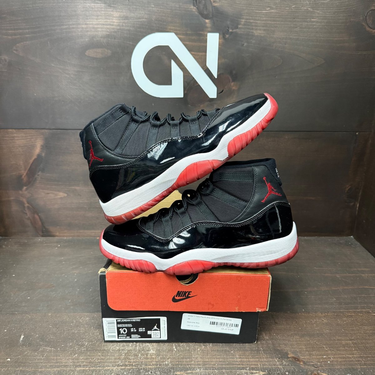 Jordan 11 Retro Playoffs Bred (2019) Size 10 (Pre-Owned) - front