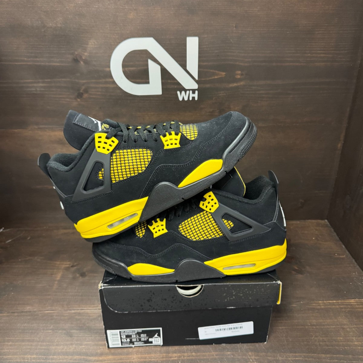 Jordan 4 Retro Thunder (2023) - Image 1